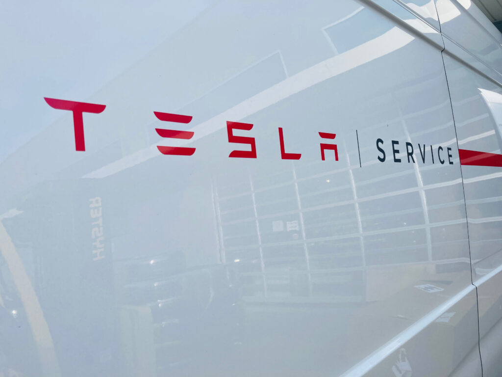 upclose view of Tesla service center sign